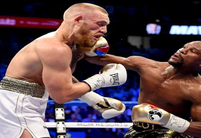 Floyd Mayweather Kalahkan Conor McGregor